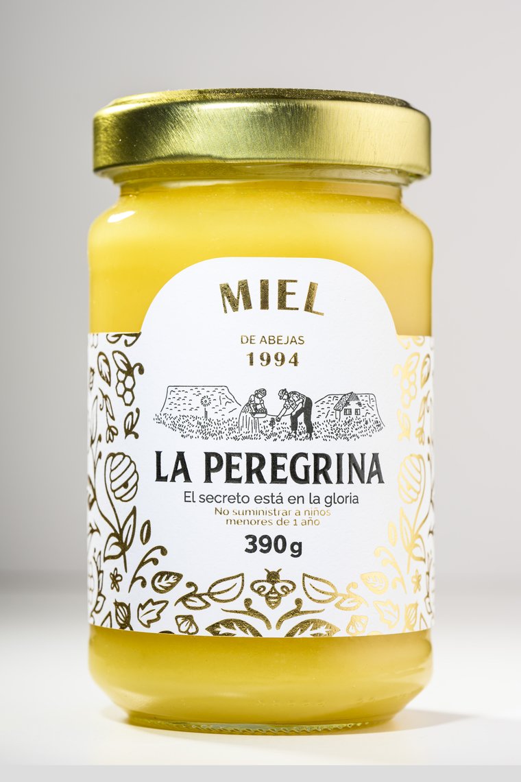 Frasco de miel cremosa